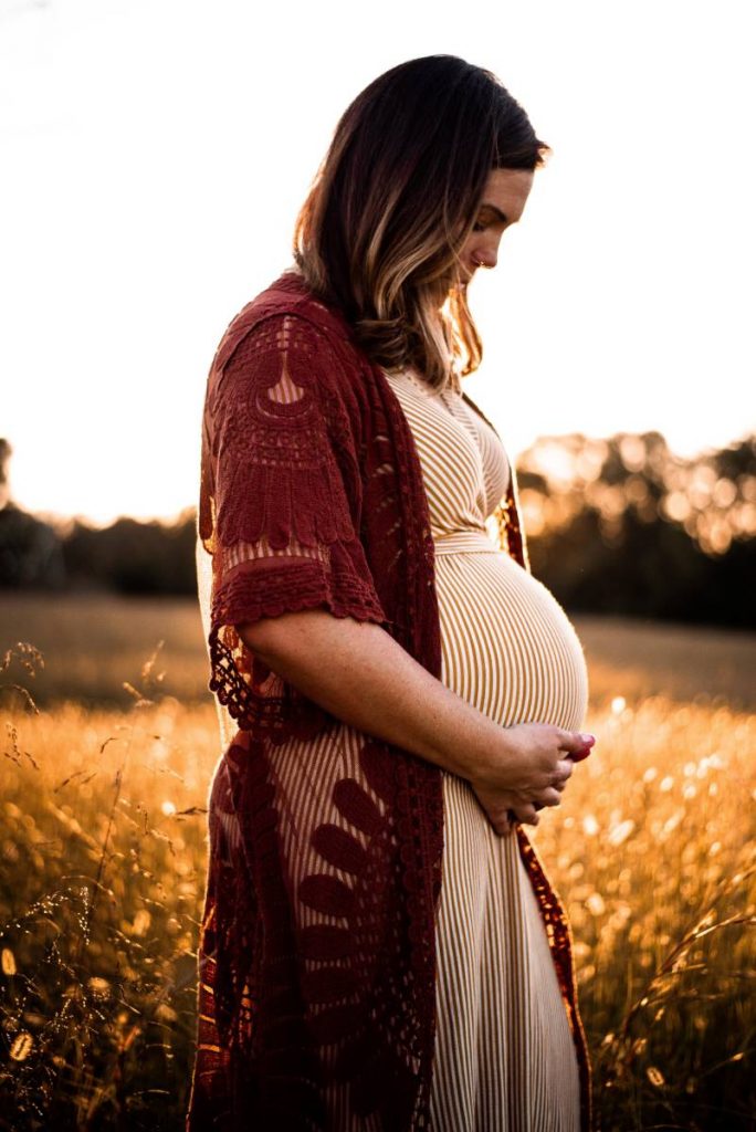 pregnant woman in a field