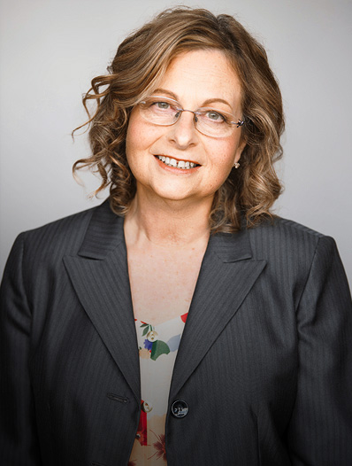 Woman smiling for a profile photo.